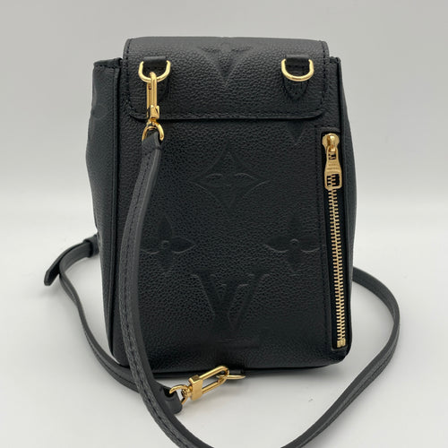 Tiny backpack Black Backpack in Monogram Empreinte Leather, Gold hardware