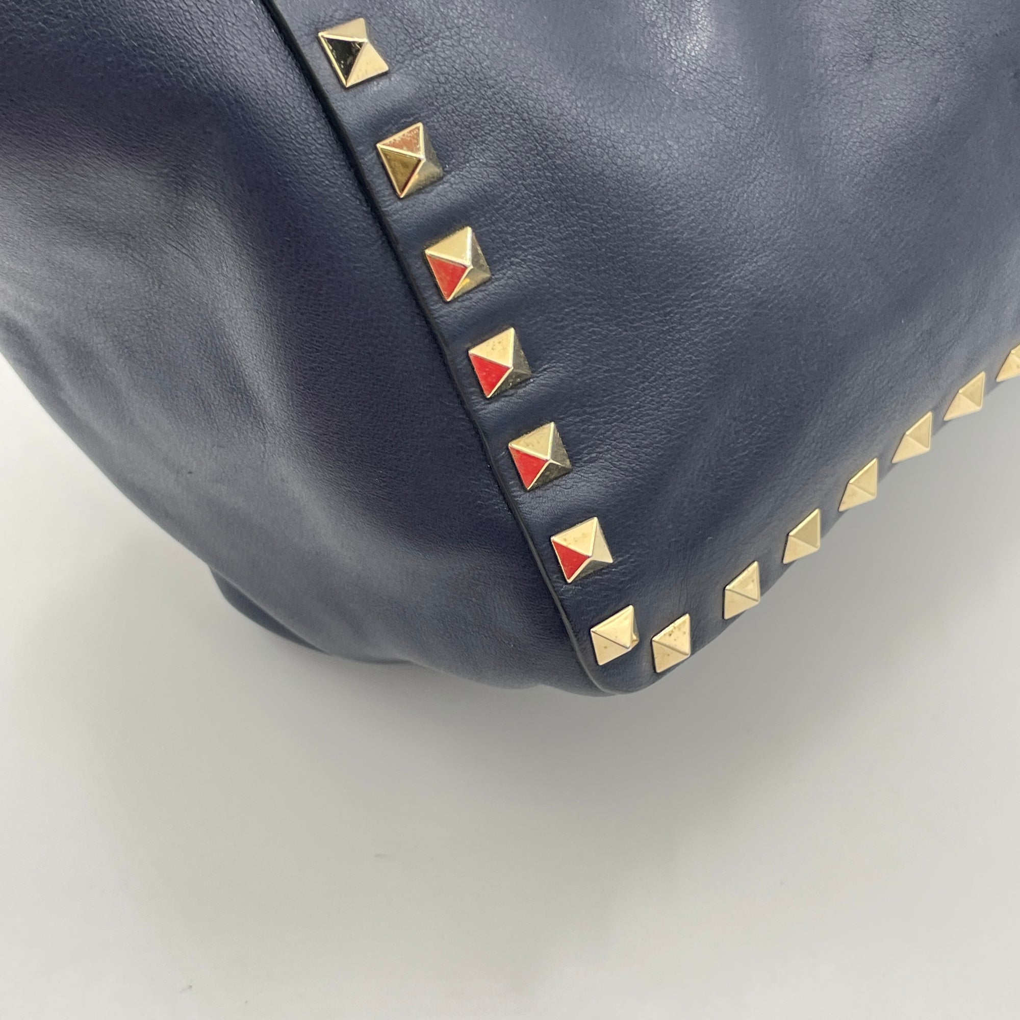 Rockstud Navy Top Handle Bag in Calfskin, Gold hardware