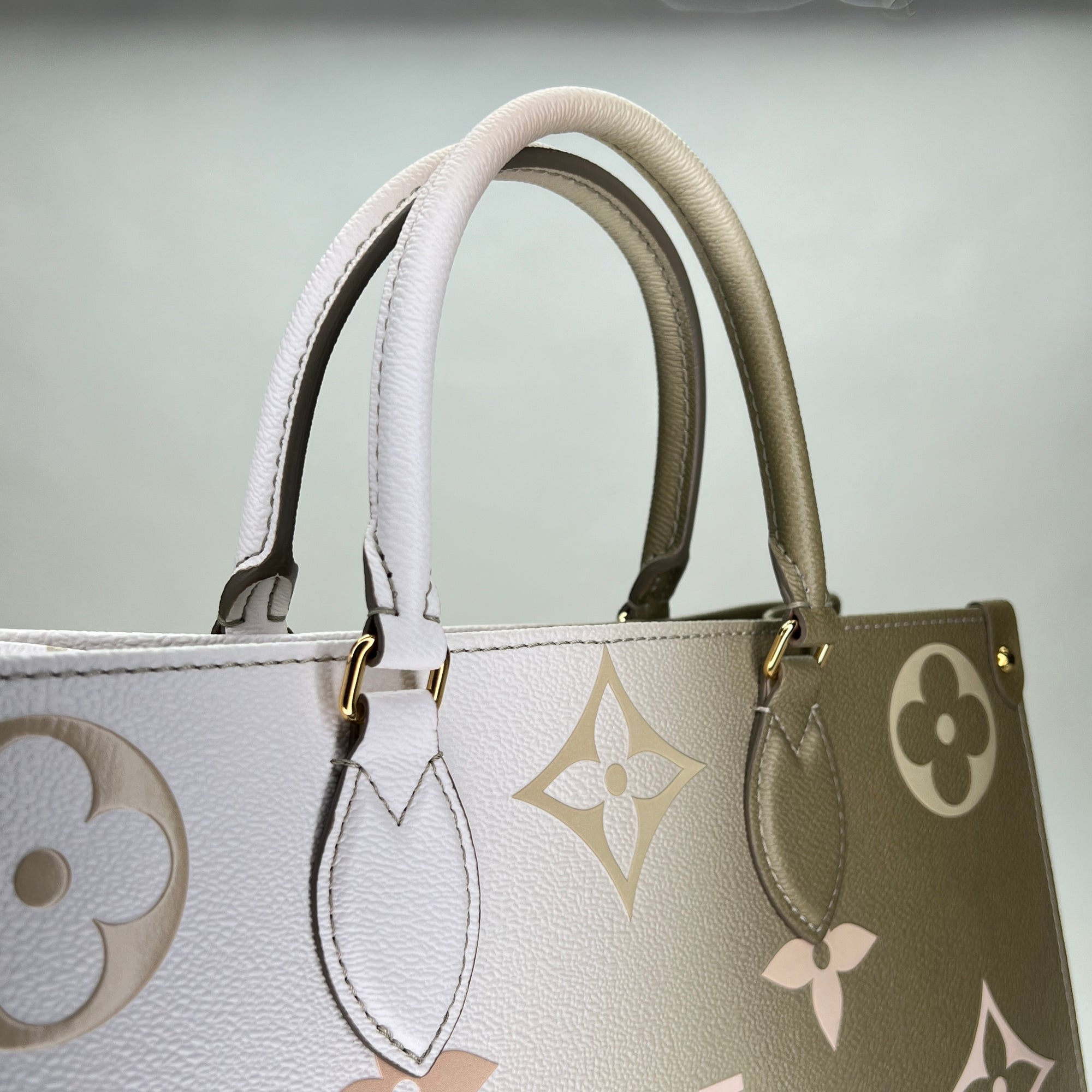 OnTheGo MM Beige Tote Bag in Coated Canvas, Gold hardware