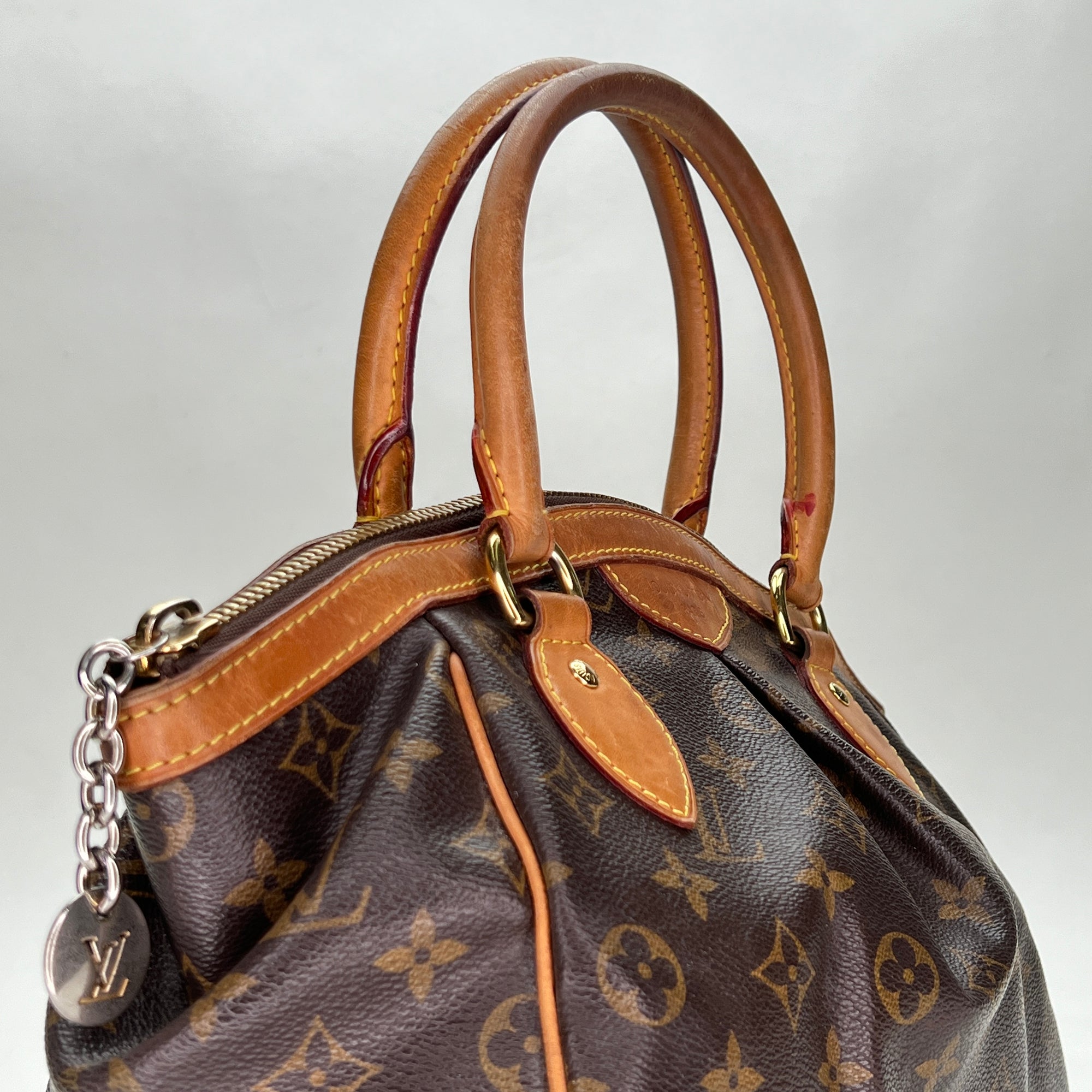 Tivoli PM Brown Top Handle Bag in Monogram Coated Canvas, Gold hardware