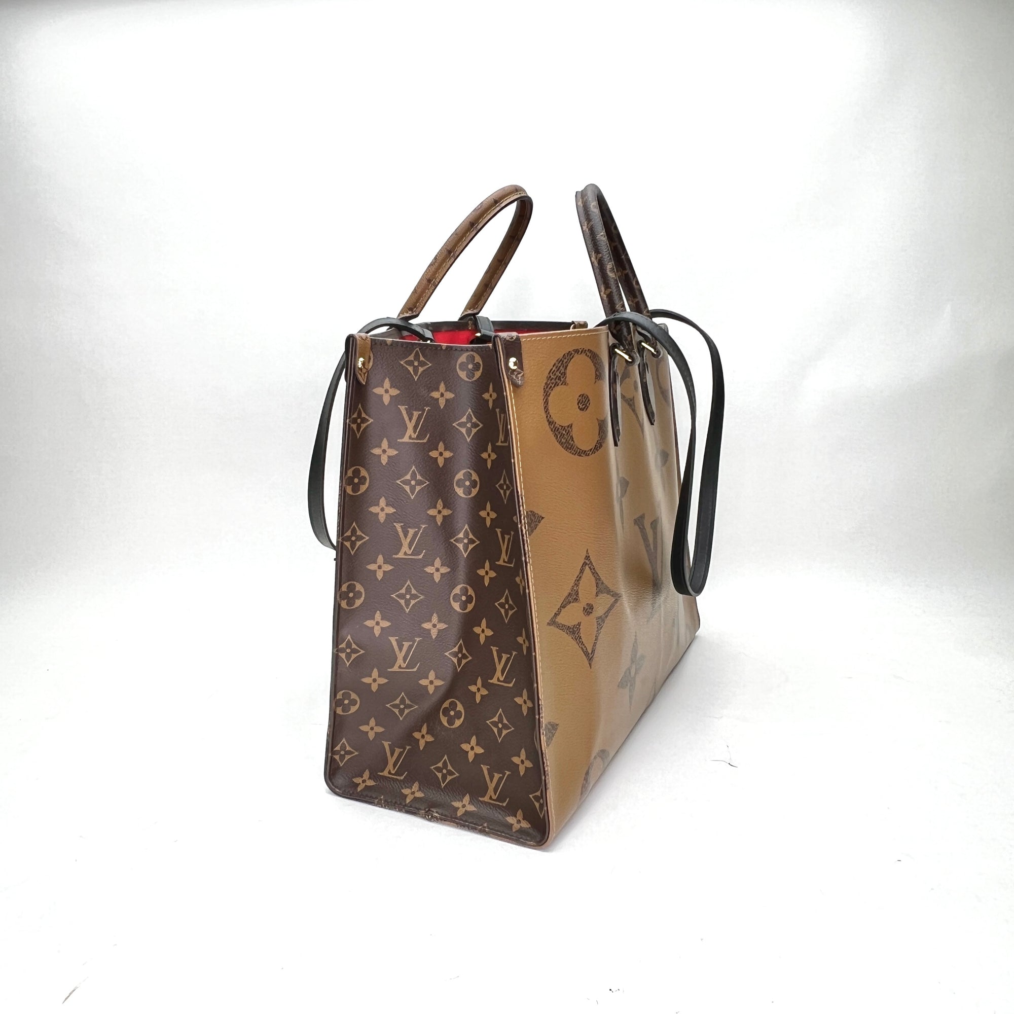 OnTheGo GM Brown Top Handle Bag in Monogram Coated Canvas, Gold hardware