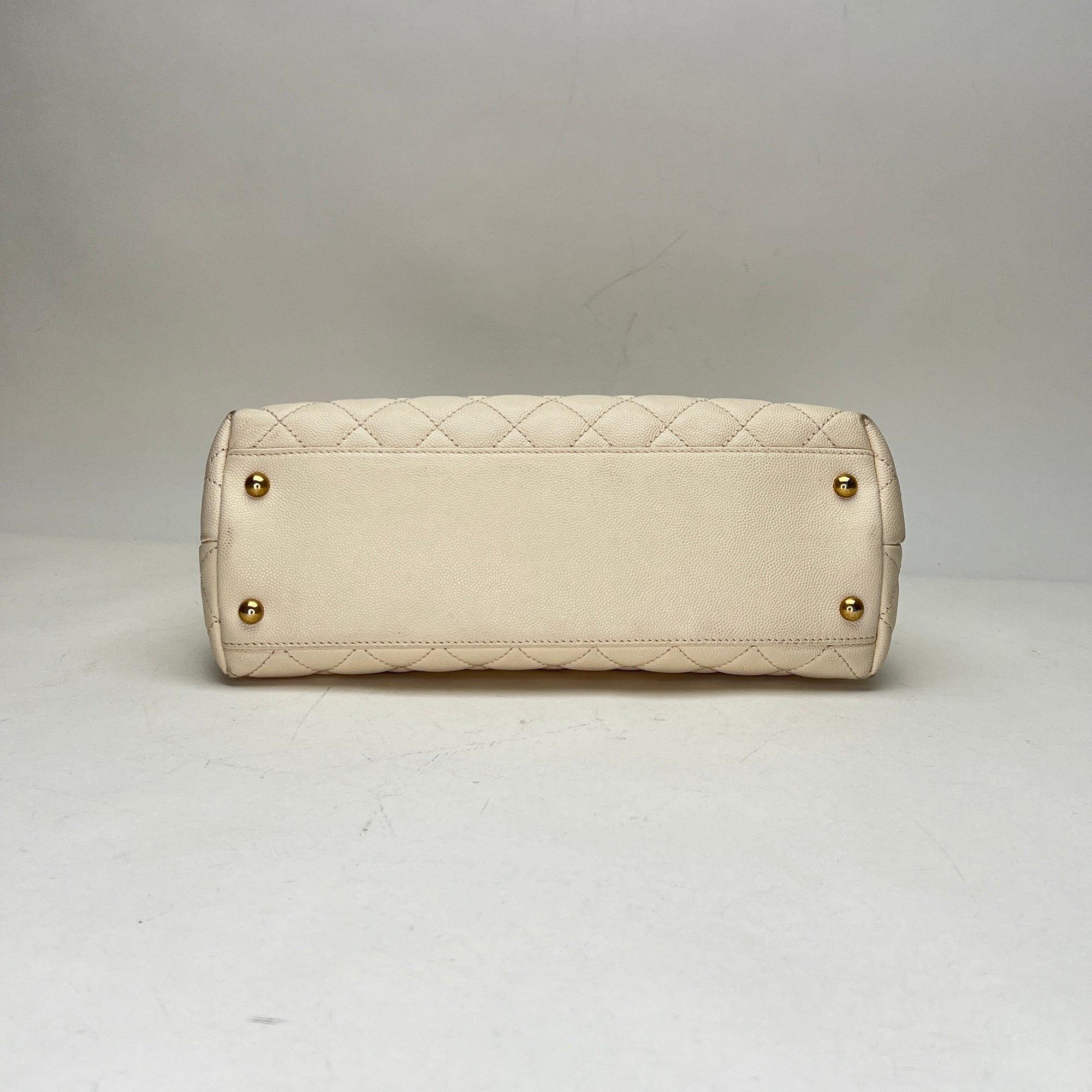 Coco Medium Beige Top Handle Bag in Caviar Leather, Gold hardware