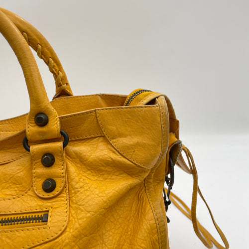 City Yellow Top Handle Bag in Distressed Leather, Antique Brass hardware