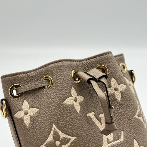 Noe Nano Bucket bag in Monogram Empreinte leather, Gold Hardware