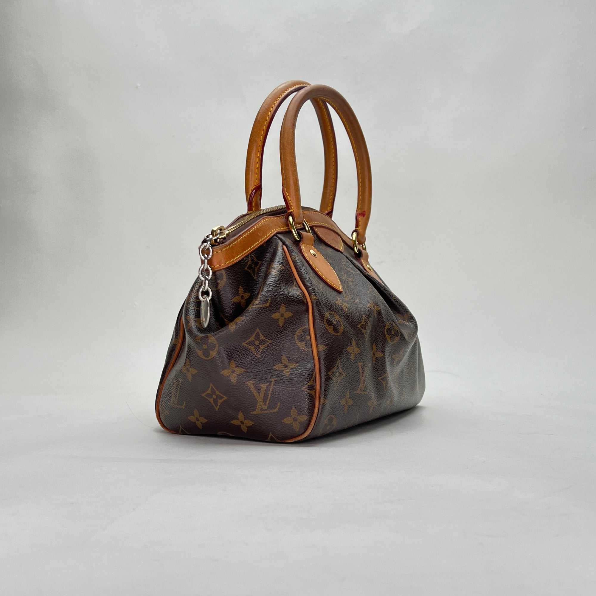 Tivoli PM Brown Top Handle Bag in Monogram Coated Canvas, Gold hardware