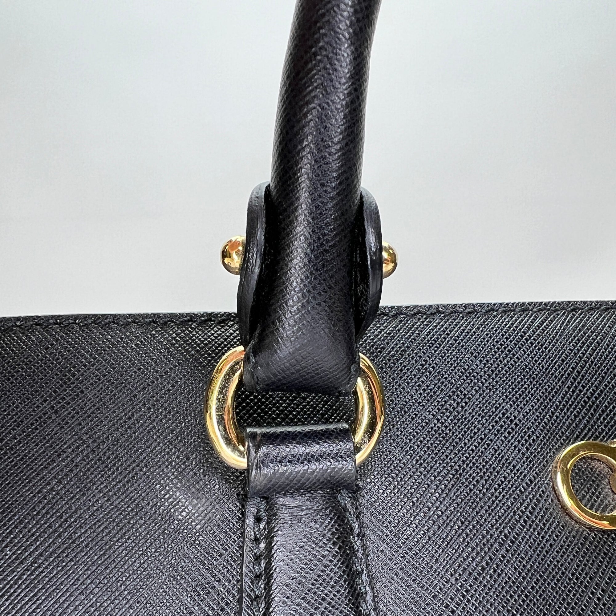 Gancini Black Top Handle Bag in Saffiano Leather, Gold hardware