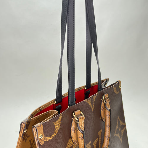 OnTheGo MM Brown Top Handle Bag in Monogram Coated Canvas, Gold hardware