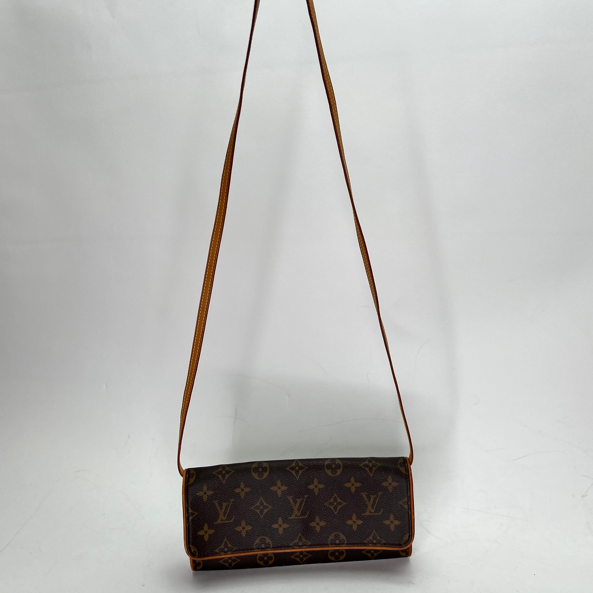 Pochette Twin GM Brown Crossbody Bag in Monogram Coated Canvas, Gold hardware