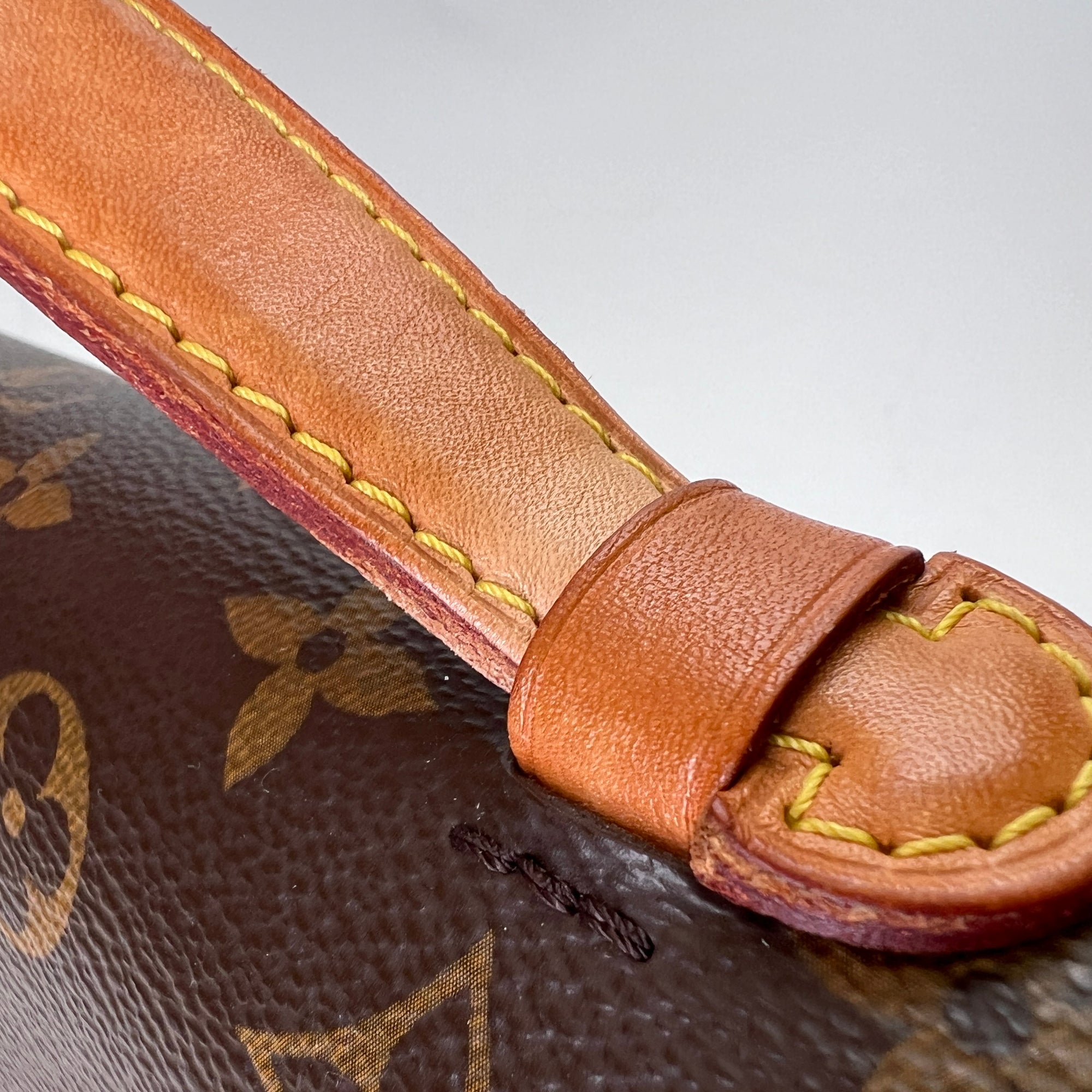 Metis Pochette Brown Crossbody Bag in Monogram Coated Canvas, Gold hardware