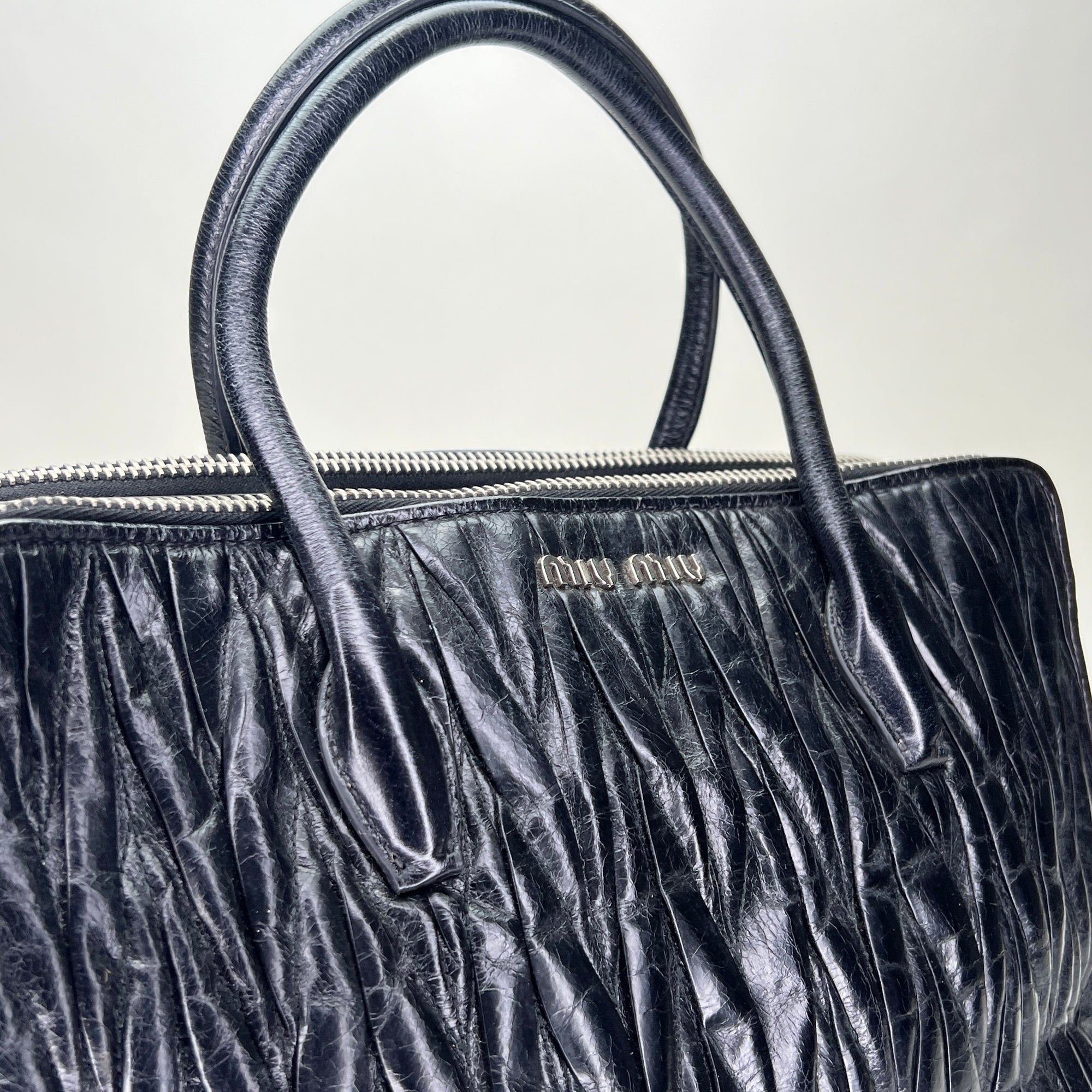 Matelasse Black Top Handle Bag in Distressed Leather, Silver hardware