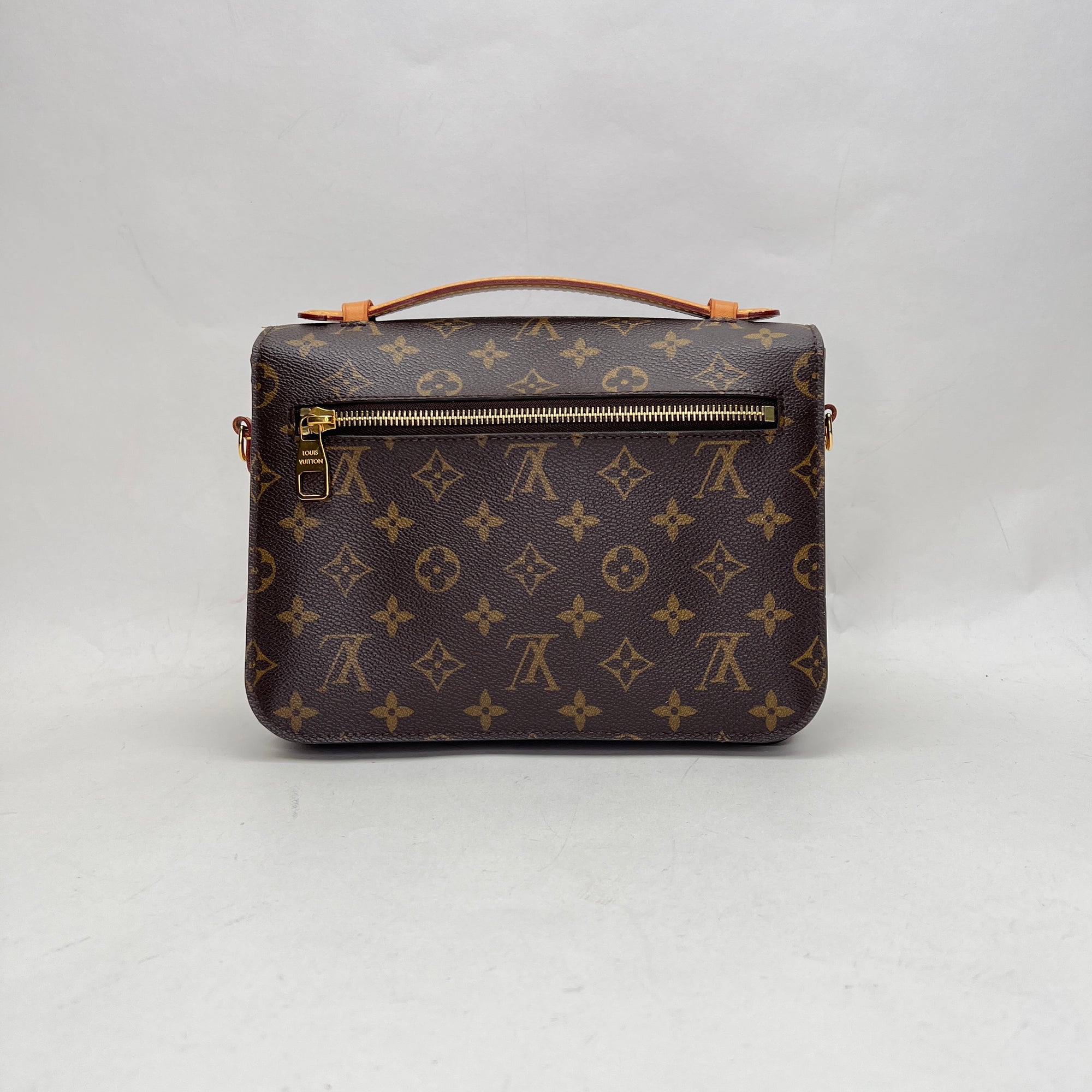 Metis Pochette Brown Crossbody Bag in Monogram Coated Canvas, Gold hardware