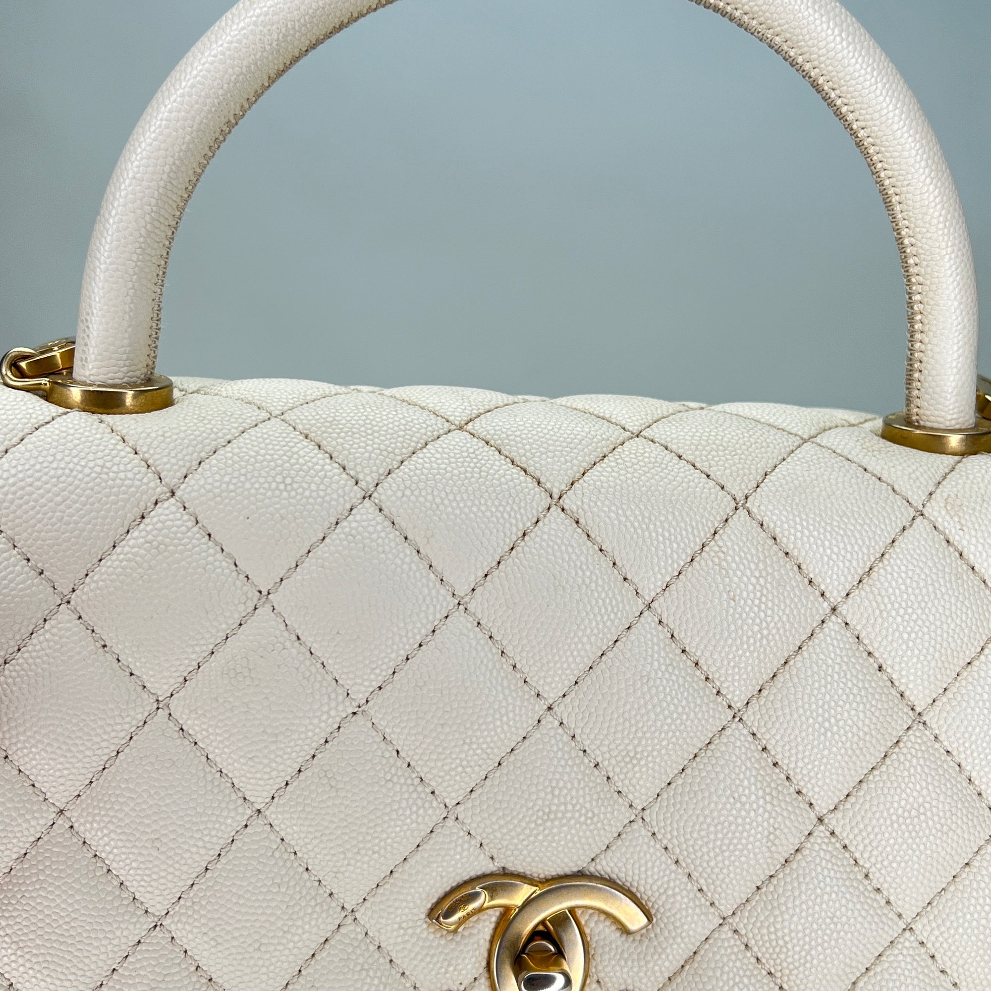 Coco Medium Beige Top Handle Bag in Caviar Leather, Gold hardware