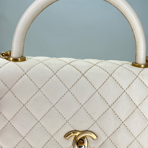 Coco Medium Beige Top Handle Bag in Caviar Leather, Gold hardware