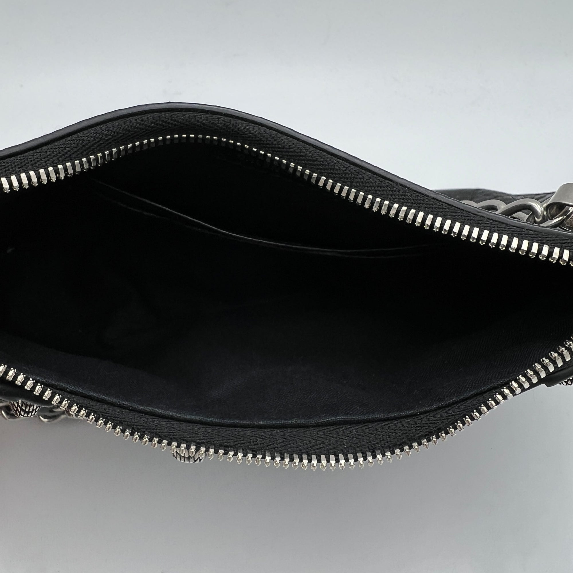 Le Cagole Mini Black Shoulder Bag in Distressed Leather, Silver hardware