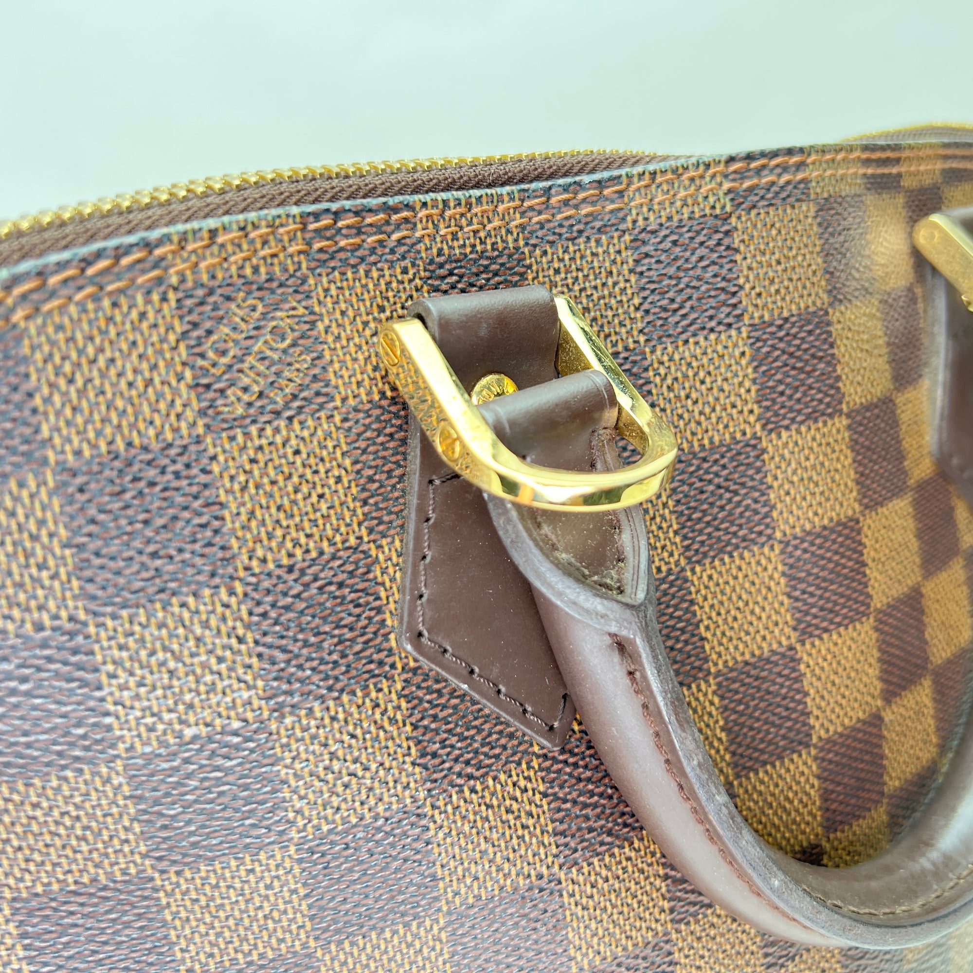 Damier Ebene Alma PM Brown Top Handle Bag in Coated Canvas, Gold hardware