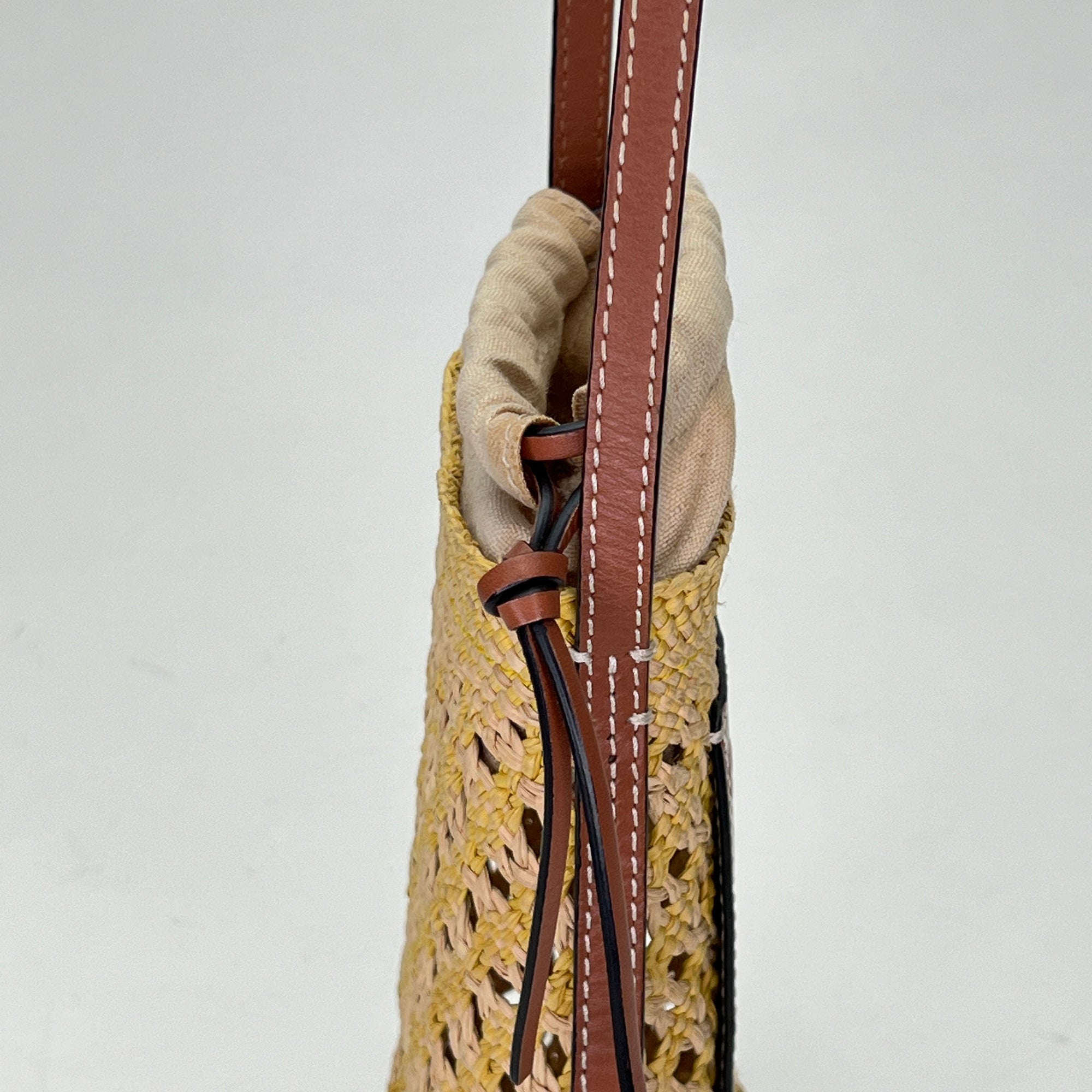 Cylinder Pouch Brown Crossbody Bag in Raffia
