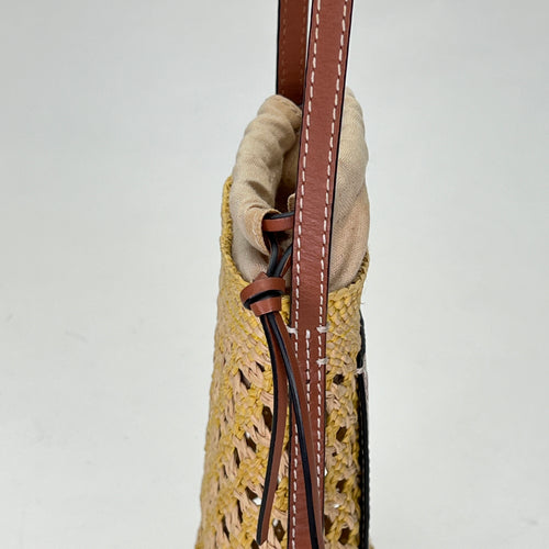 Cylinder Pouch Brown Crossbody Bag in Raffia