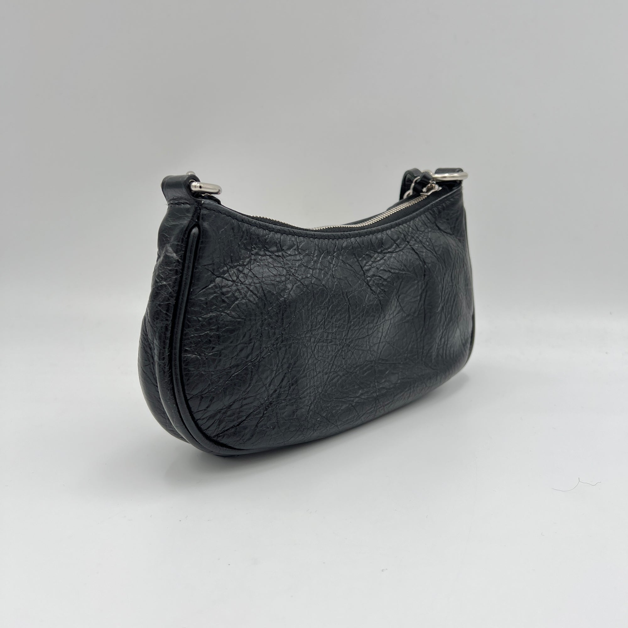 Le Cagole Mini Black Shoulder Bag in Distressed Leather, Silver hardware