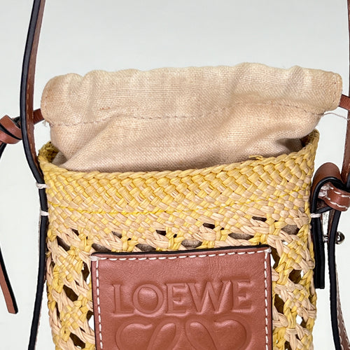 Cylinder Pouch Brown Crossbody Bag in Raffia