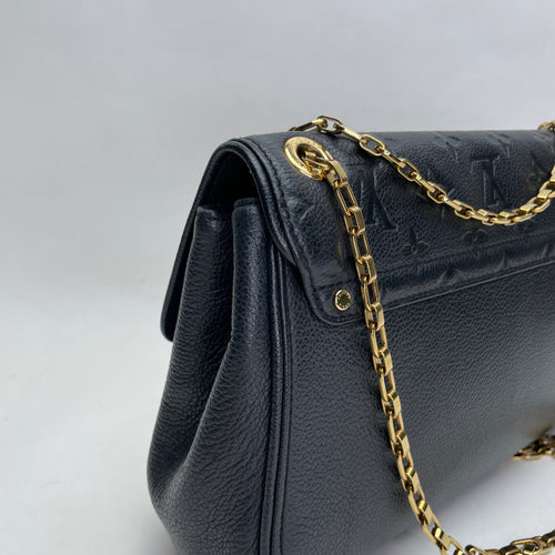 Saint Germain PM Black Shoulder Bag in Monogram Empreinte Leather, Gold hardware