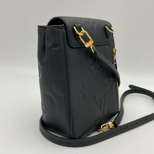 Tiny backpack Black Backpack in Monogram Empreinte Leather, Gold hardware