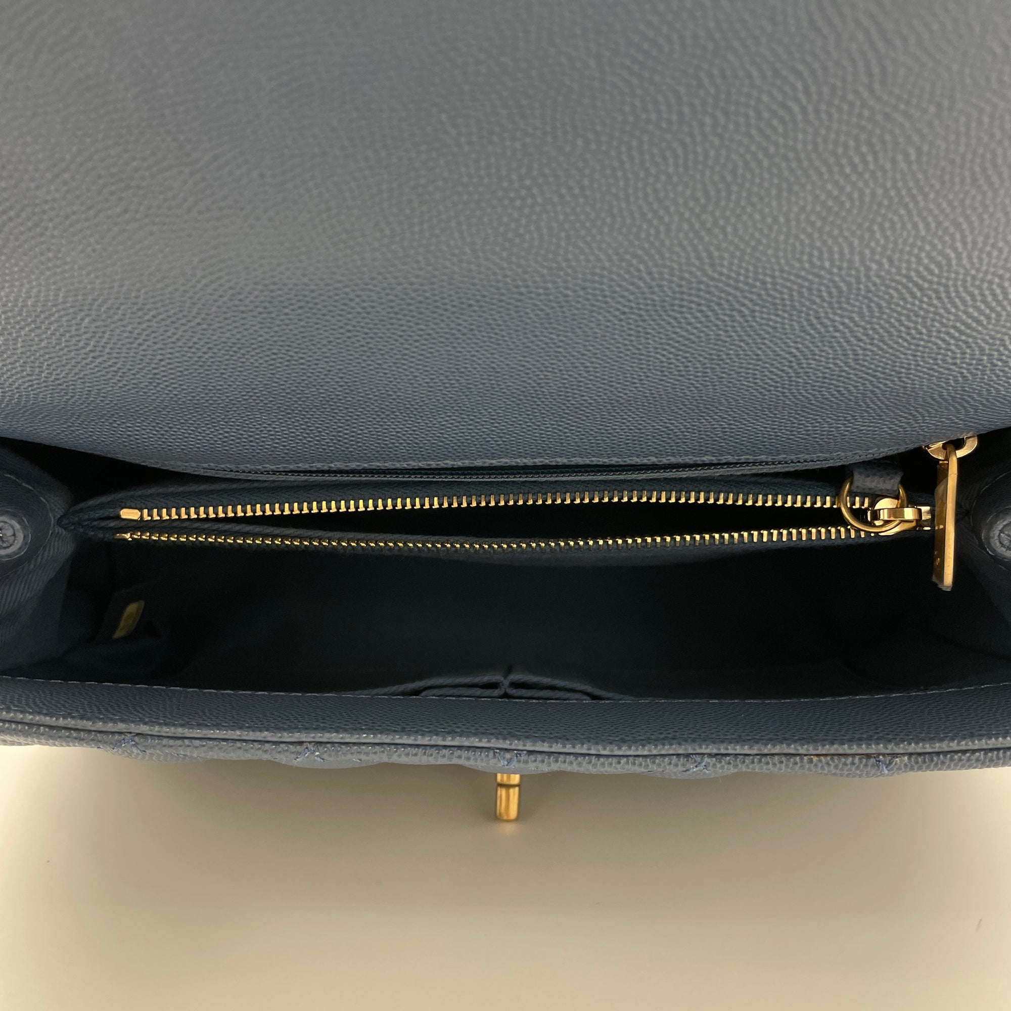 Coco Flap Top handle bag in Caviar leather, Gold Hardware