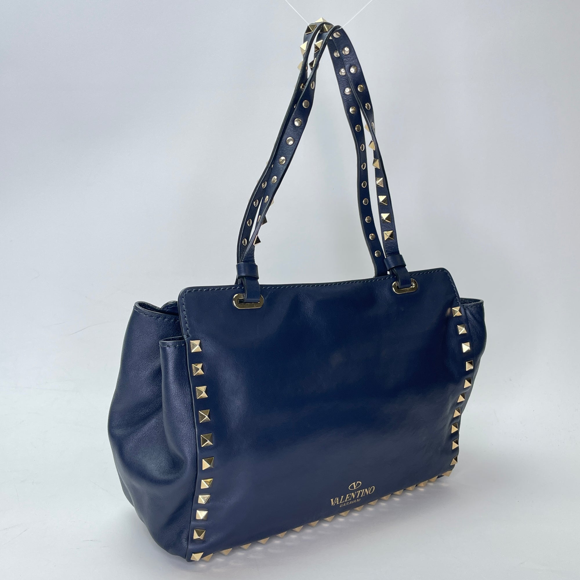 Rockstud Navy Top Handle Bag in Calfskin, Gold hardware