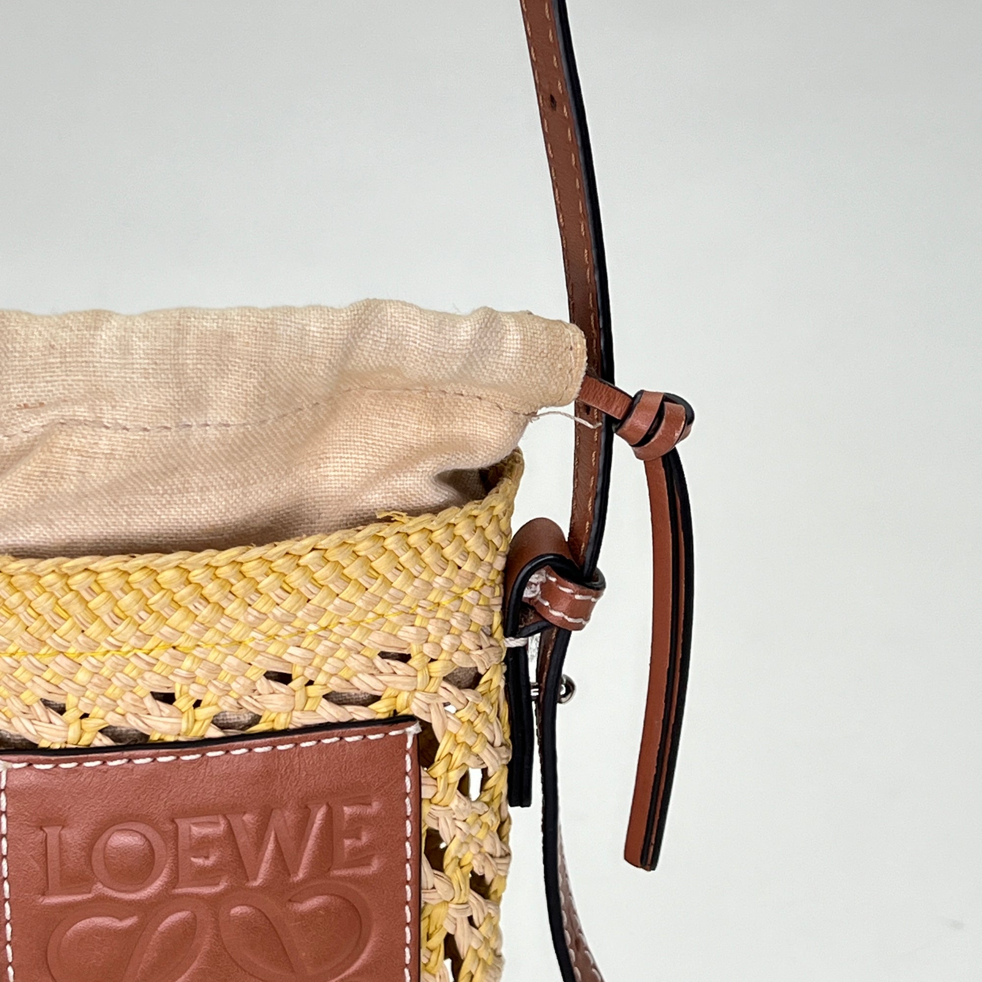 Cylinder Pouch Brown Crossbody Bag in Raffia