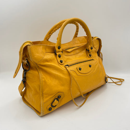 City Yellow Top Handle Bag in Distressed Leather, Antique Brass hardware