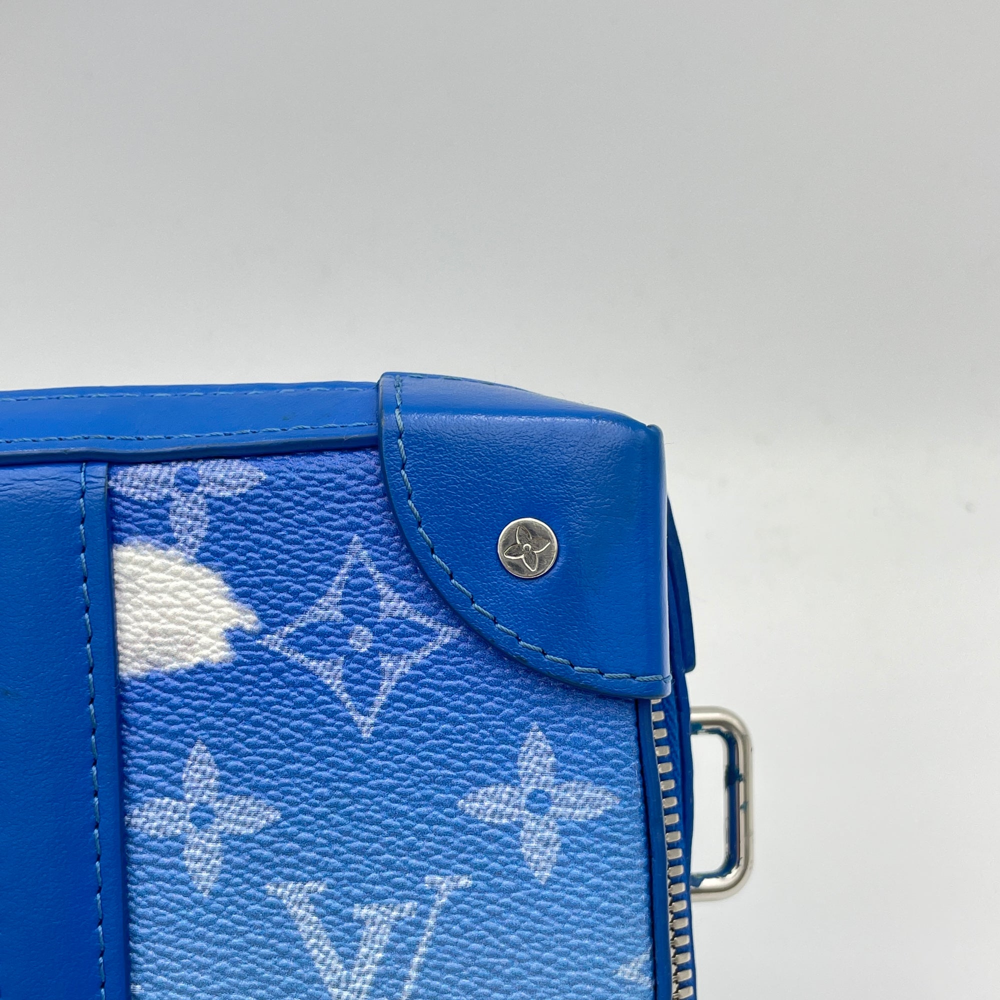 Clouds Soft Trunk Wallet Blue Crossbody Bag in Monogram Coated Canvas, Silver hardware