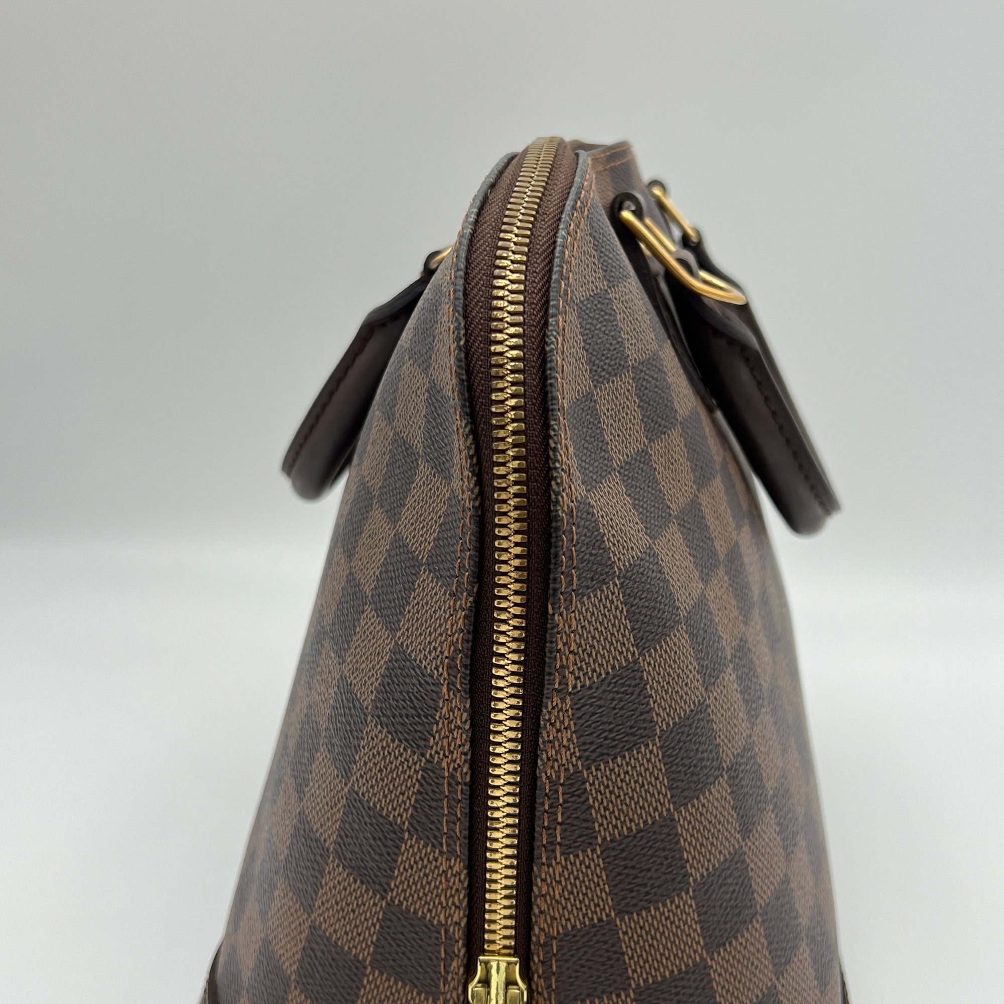 Damier Ebene Alma PM Brown Top Handle Bag in Coated Canvas, Gold hardware