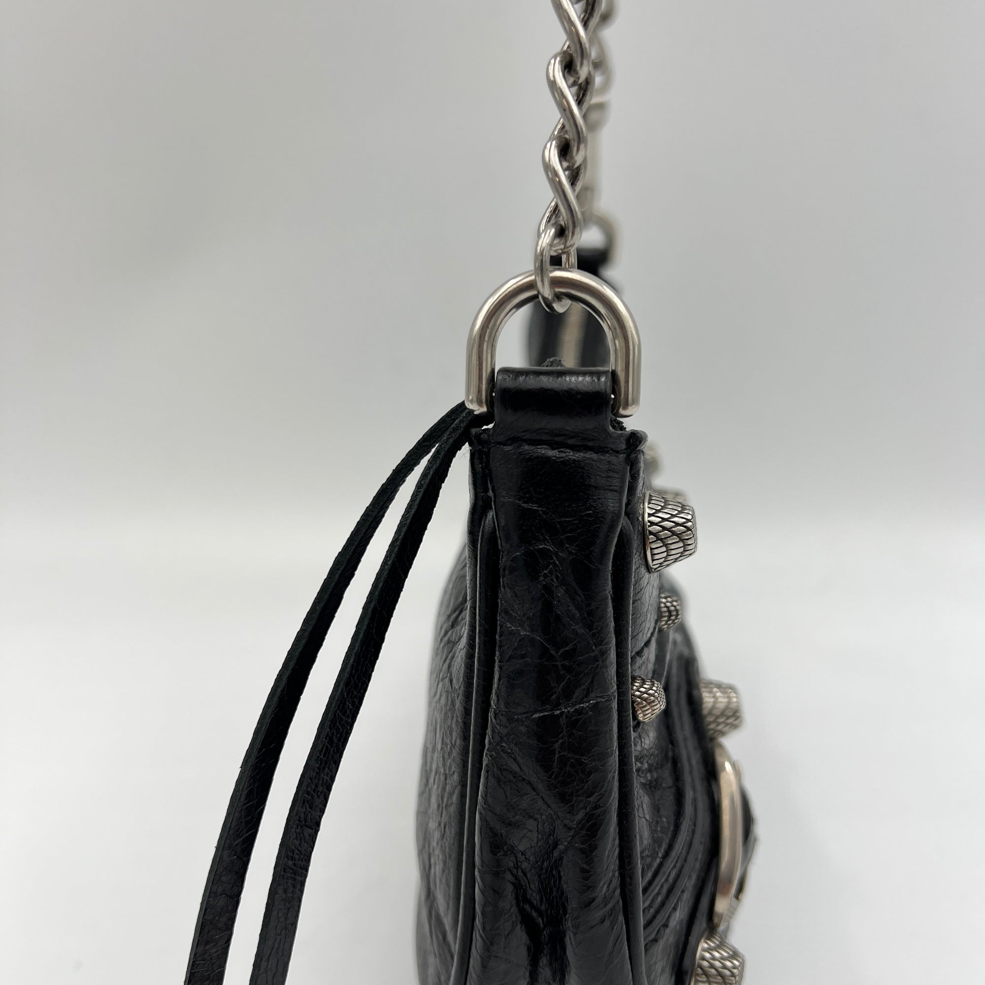 Le Cagole Mini Black Shoulder Bag in Distressed Leather, Silver hardware