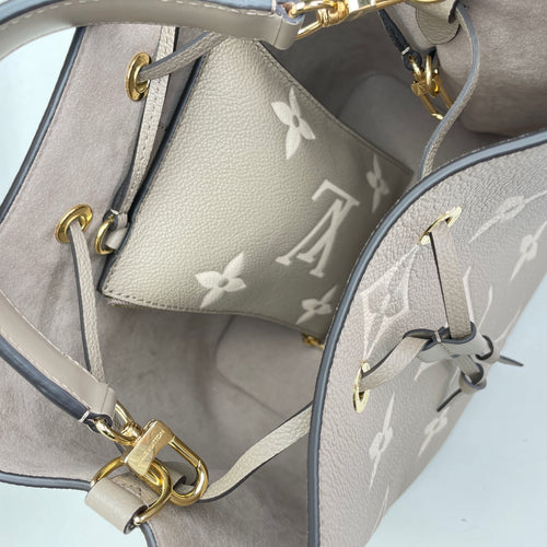 NeoNoe Beige Bucket Bag in Monogram Empreinte Leather, Gold hardware