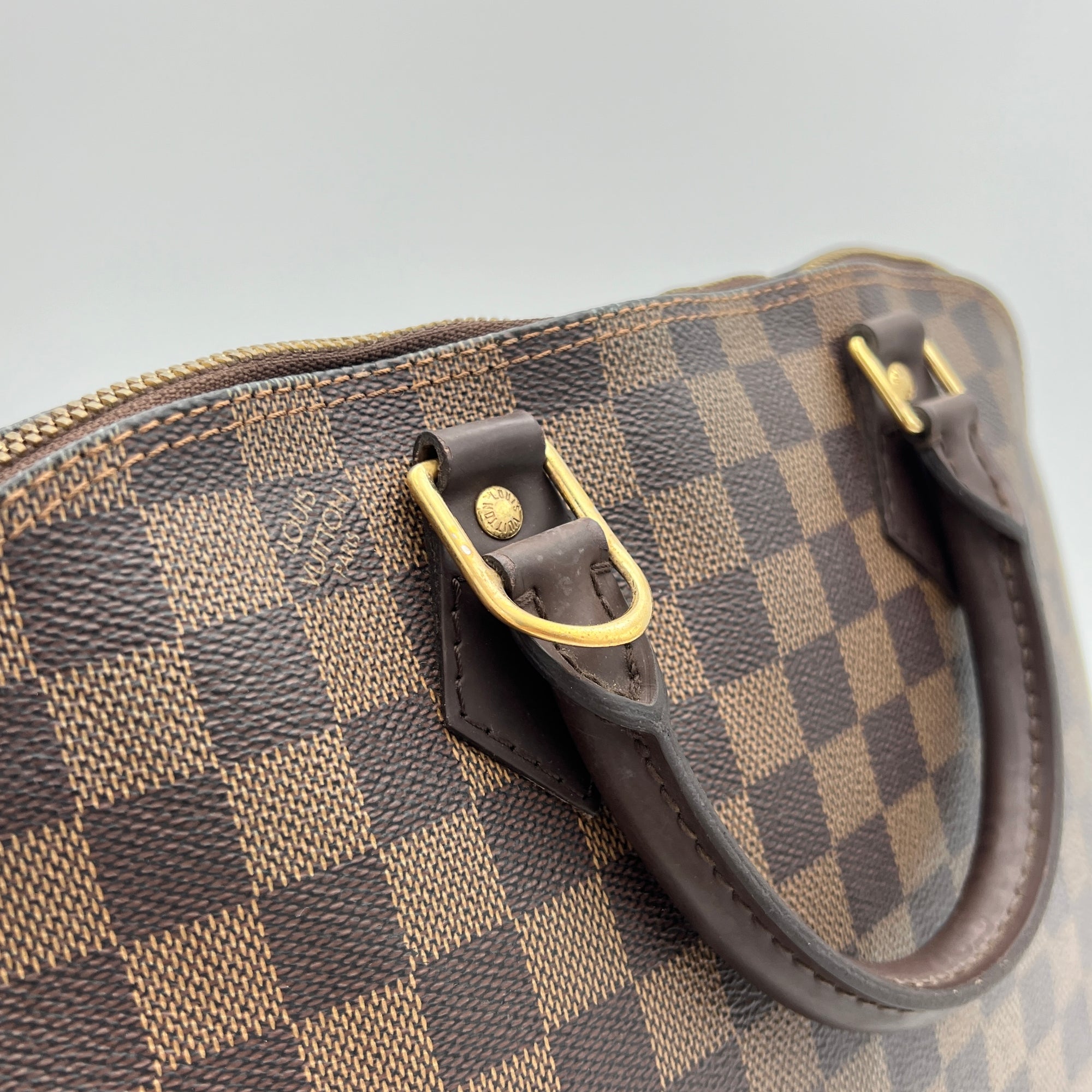 Damier Ebene Alma PM Brown Top Handle Bag in Coated Canvas, Gold hardware