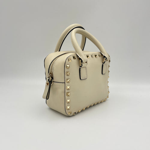 Rockstud Cream Top Handle Bag in Calfskin, Gold hardware