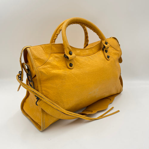 City Yellow Top Handle Bag in Distressed Leather, Antique Brass hardware