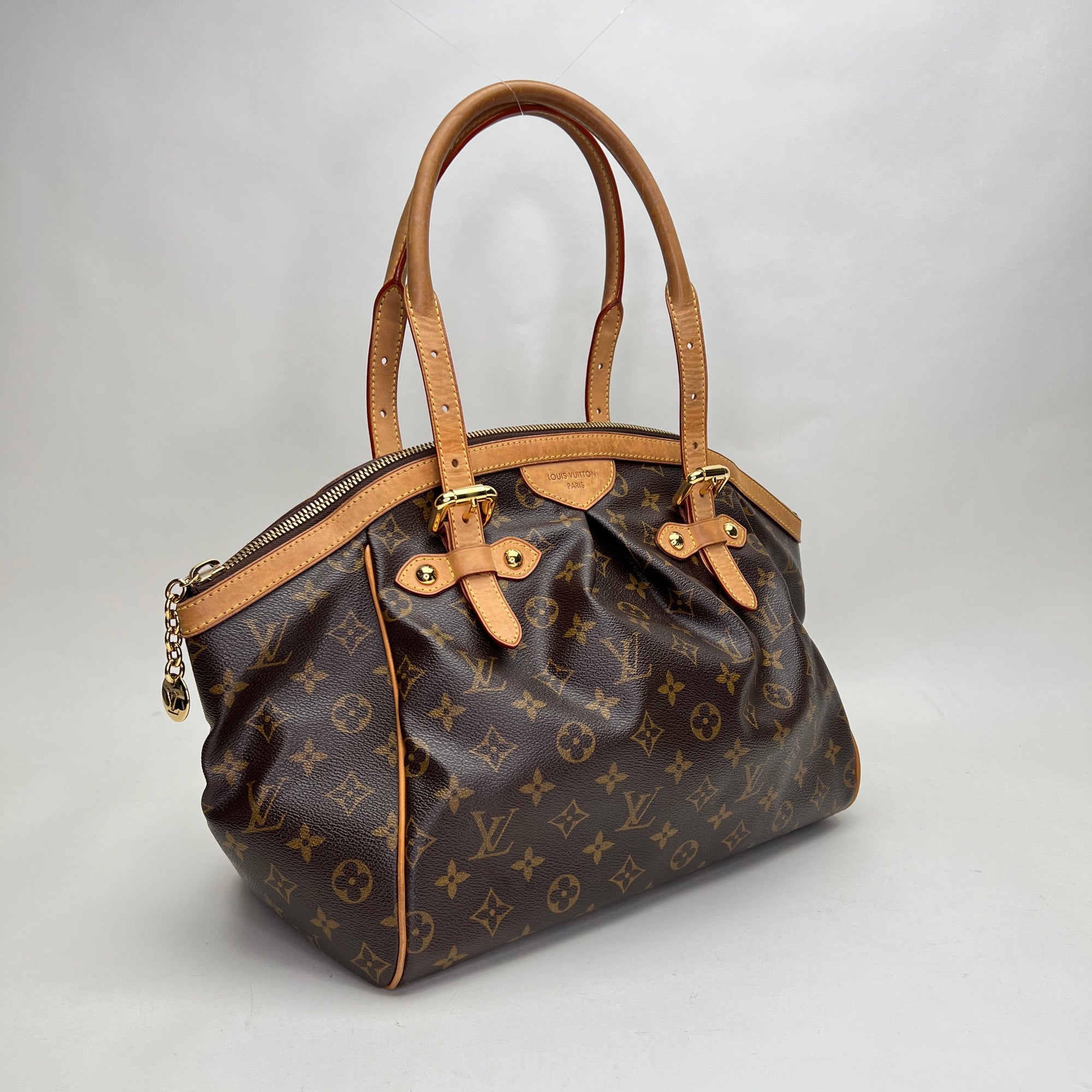 Tivoli GM Brown Top Handle Bag in Monogram Coated Canvas, Gold hardware