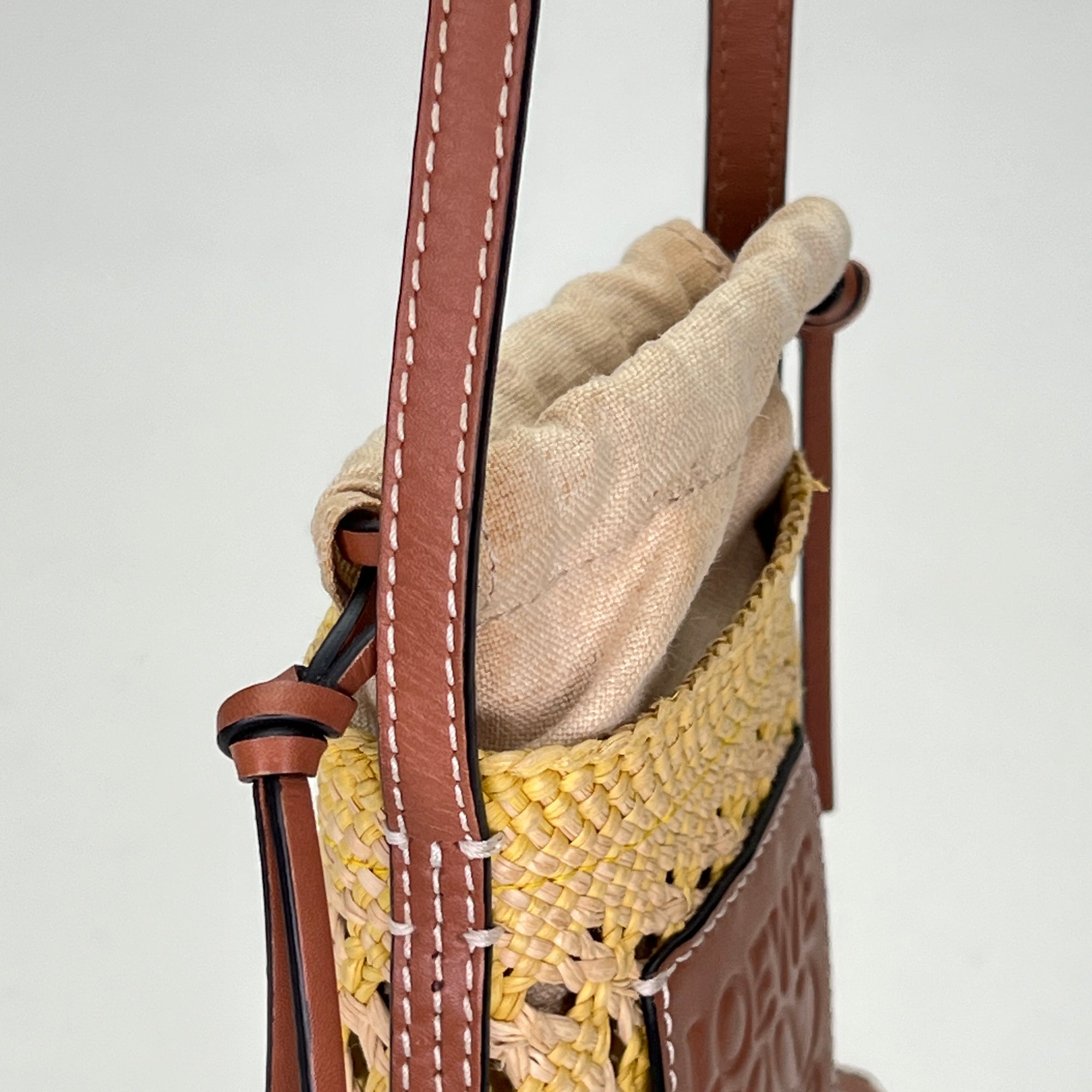 Cylinder Pouch Brown Crossbody Bag in Raffia