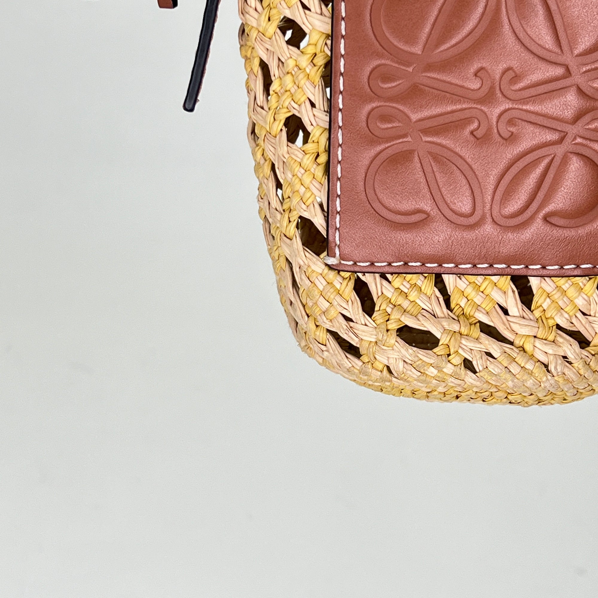 Cylinder Pouch Brown Crossbody Bag in Raffia